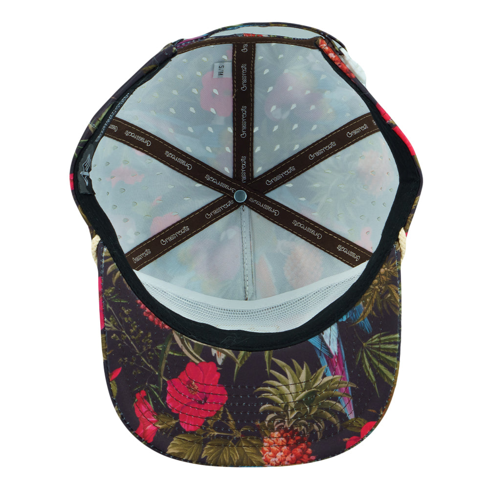 Tropical print zipperback hat with purple accents and black brim, six-panel design