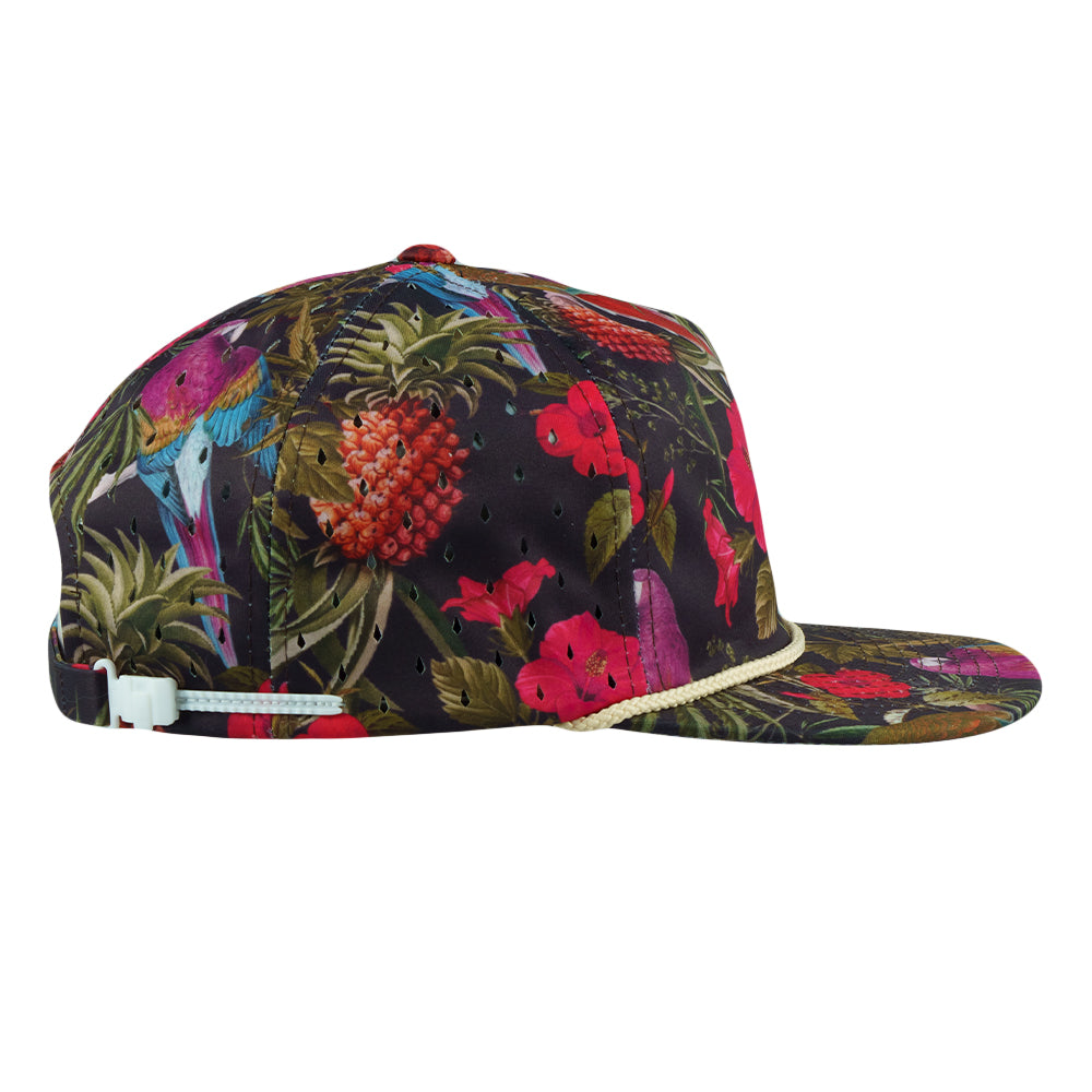 Tropical print zipperback hat in black with colorful parrot and floral pattern; side view