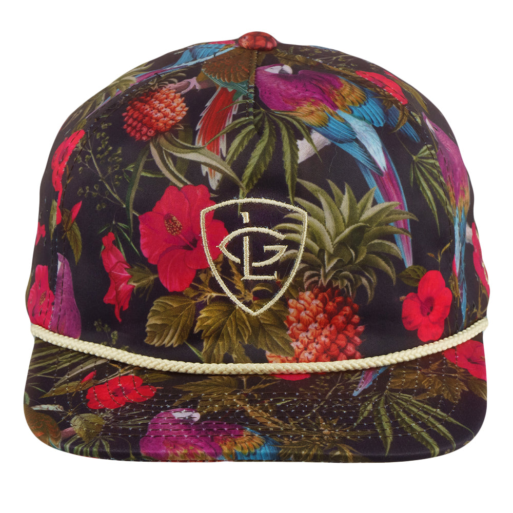 Tropical print zipperback hat with embroidered shield logo and gold trim; front view
