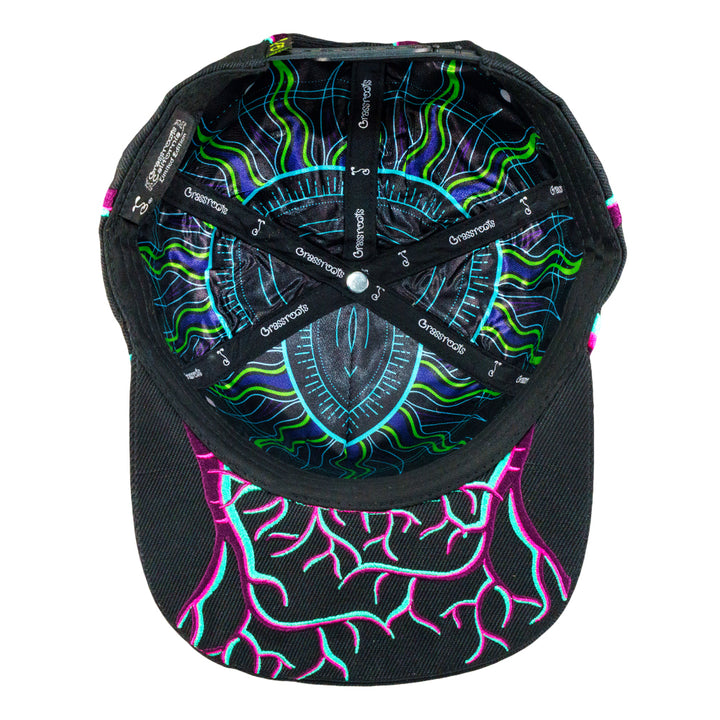 Black snapback hat with neon tree-line embroidery and colorful interior graphic.