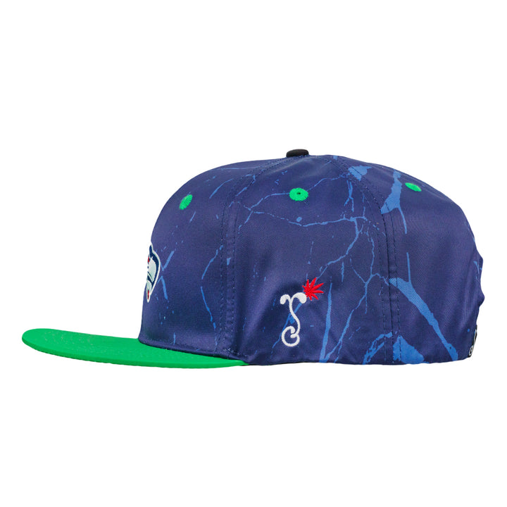 Navy snapback hat with red-and-white swirl logo, green brim