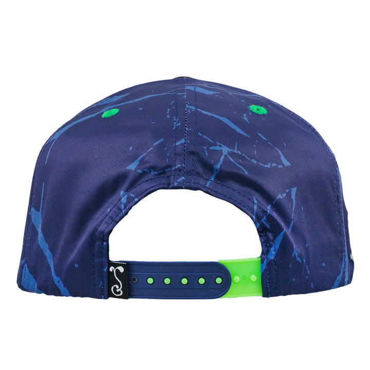 Navy snapback hat with green adjustable strap and rear seams