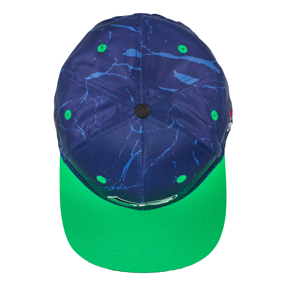 Navy snapback hat with green brim and small green grommets