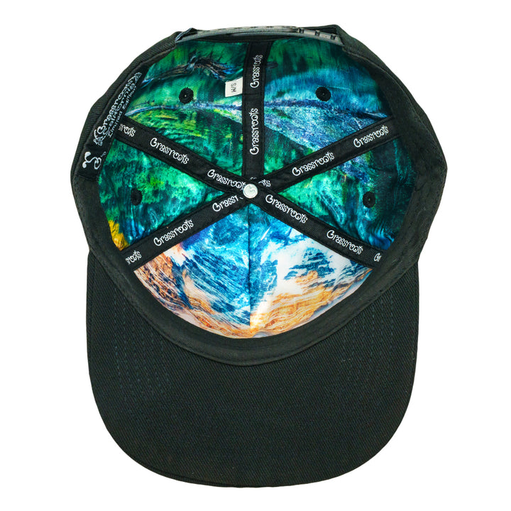 Black snapback hat with inside seam straps and multicolor printed graphic panel