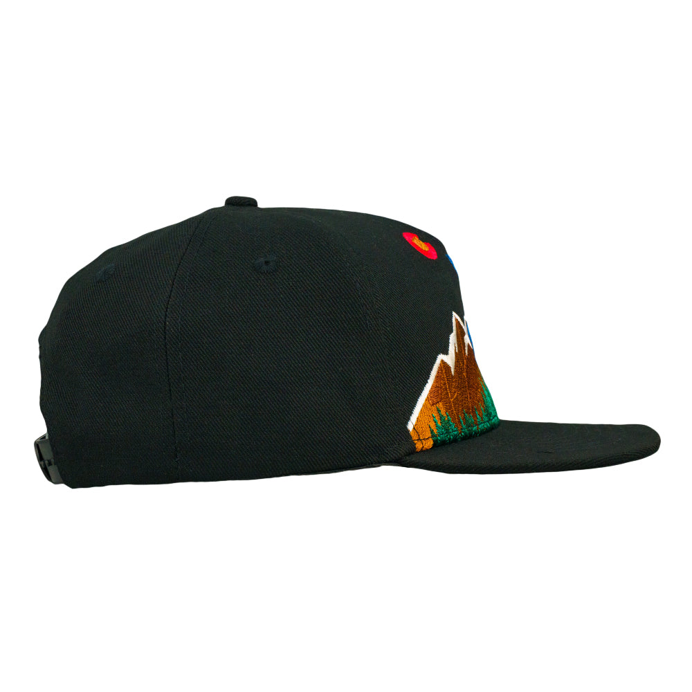 Black snapback hat side view with colorful mountain graphic embroidered on crown