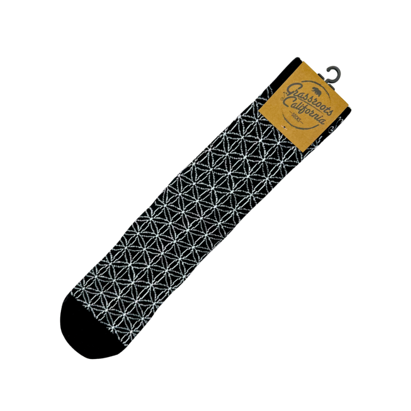 Black crew socks with white geometric pattern, ribbed cuffs