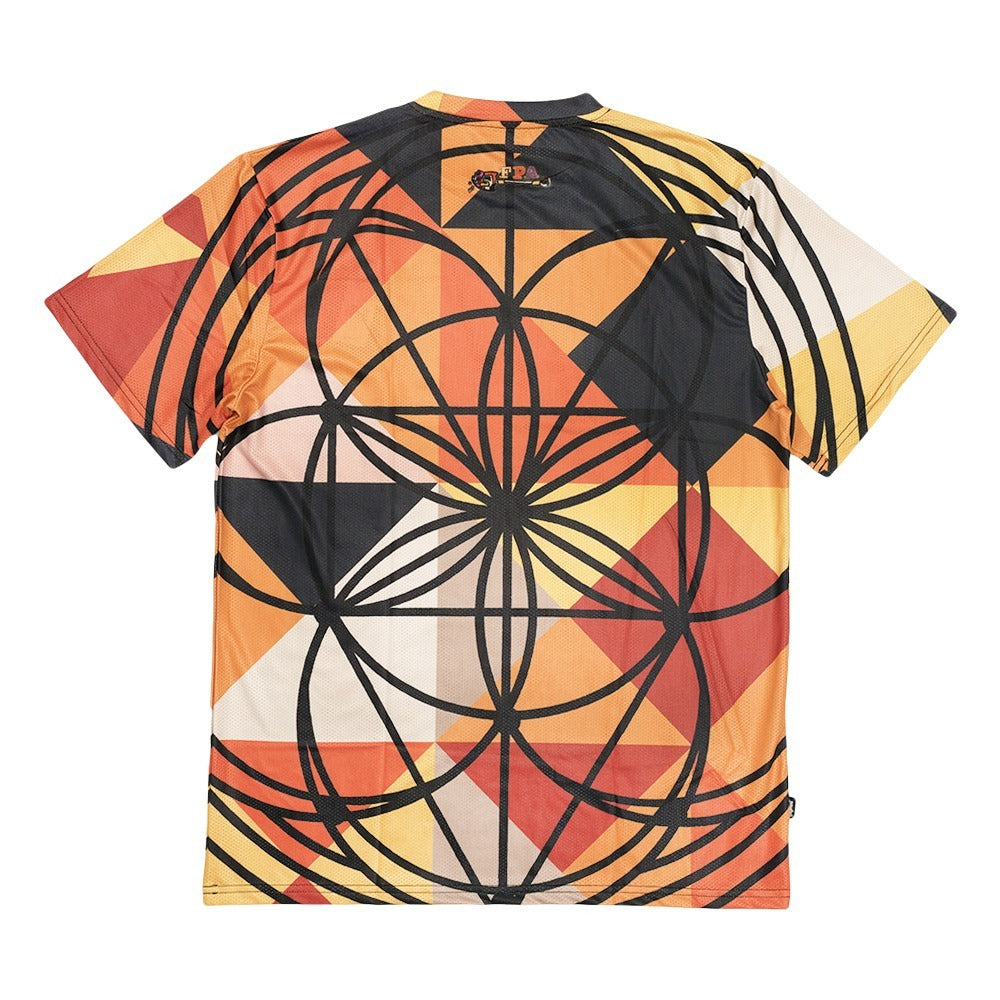 Multi-color T-shirt with geometric circle black orange art on the back, short sleeves