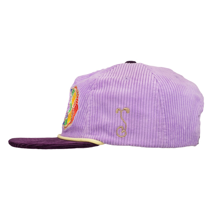 Purple corduroy snapback hat side view with small gold om symbol