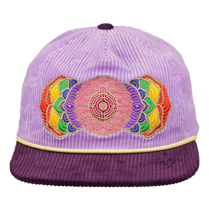 Purple corduroy snapback hat angled front view with multicolor chakra flower embroidery