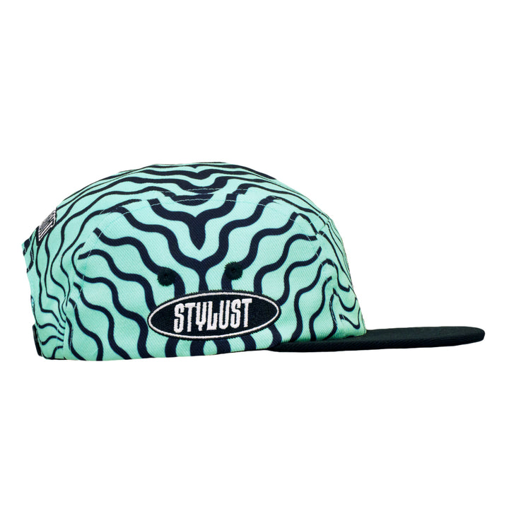 Seafoam wavy 5-panel snapback hat with black side label and flat brim