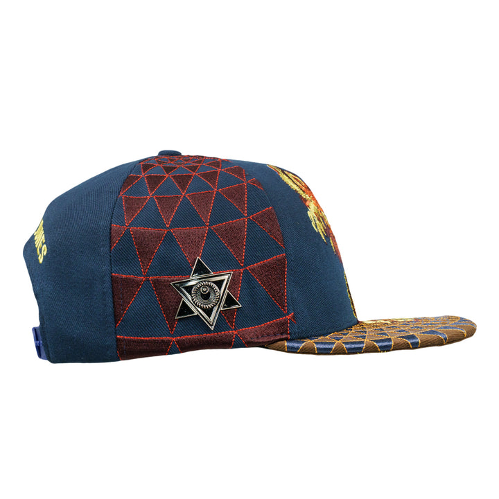 Navy snapback cap with red geometric panel and star-shaped emblem