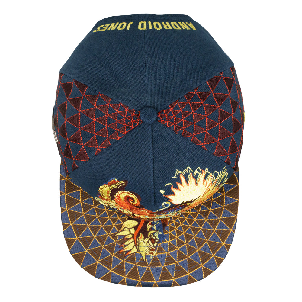 Navy snapback cap back view with orange dragon embroidery and gold geometric pattern