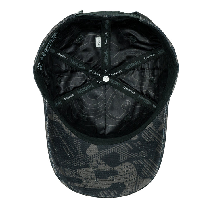 Black camo snapback hat interior with adjustable snap strap and printed lining