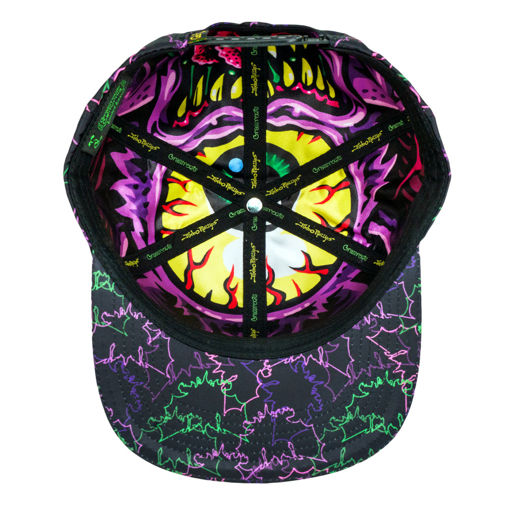 Black snapback hat, top view with neon purple, green, and yellow face graphic