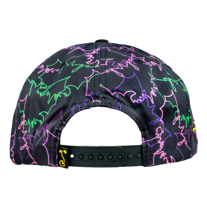 Snapback hat underside showing adjustable black strap and neon graffiti fabric