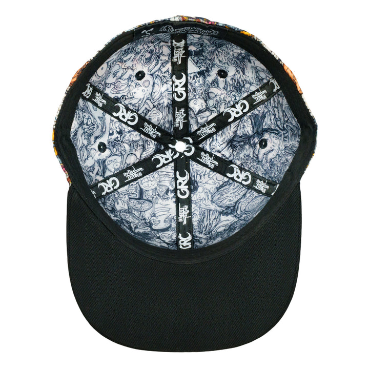 Fitted cap underside with a black brim, illustrated lining, and branded seam tape