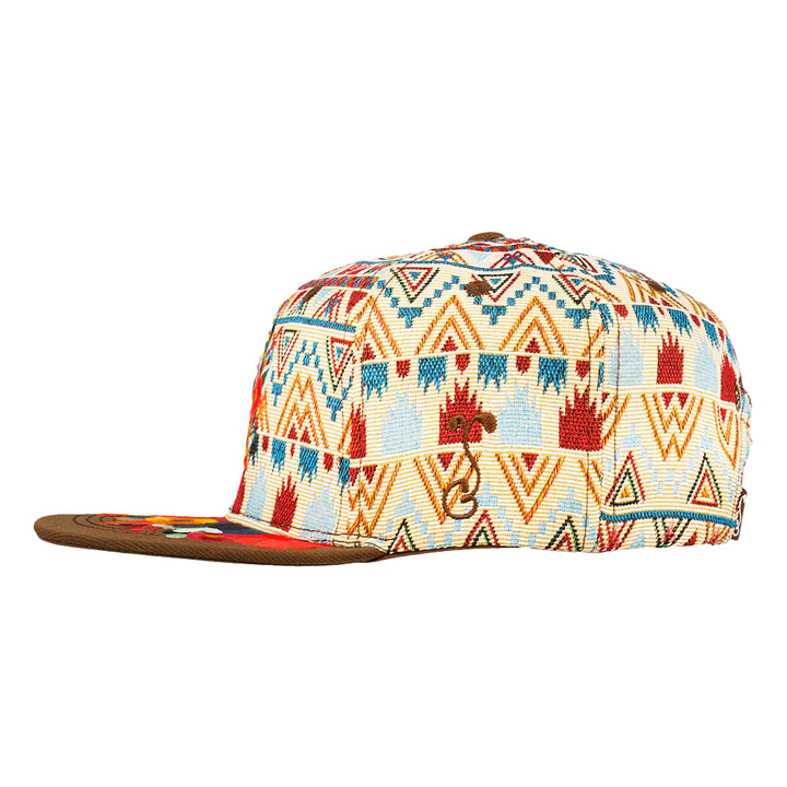 Brown snapback hat with white, red, and blue aztec pattern, side profile